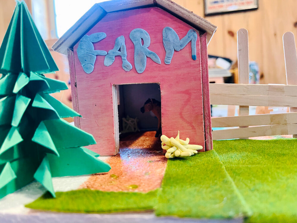 kid's craft project of a barn